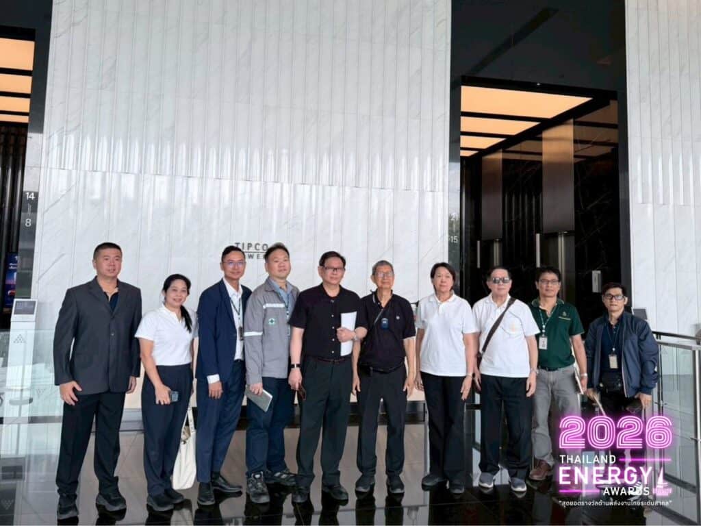 Group of professionals standing in front of Tipco Tower building.